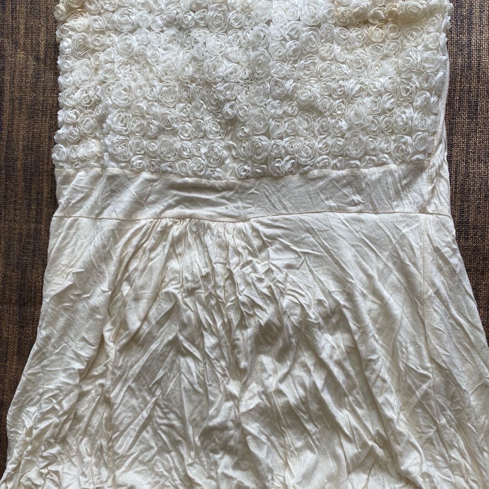 Elegant Cream Strapless top with Rosette Detail